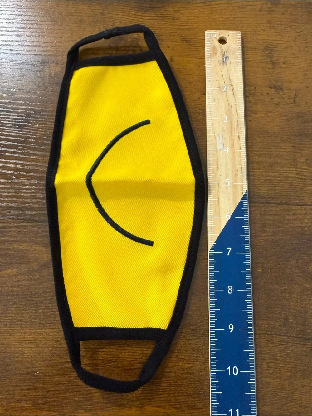 Yellow Smiley Face Mask with Black Trim